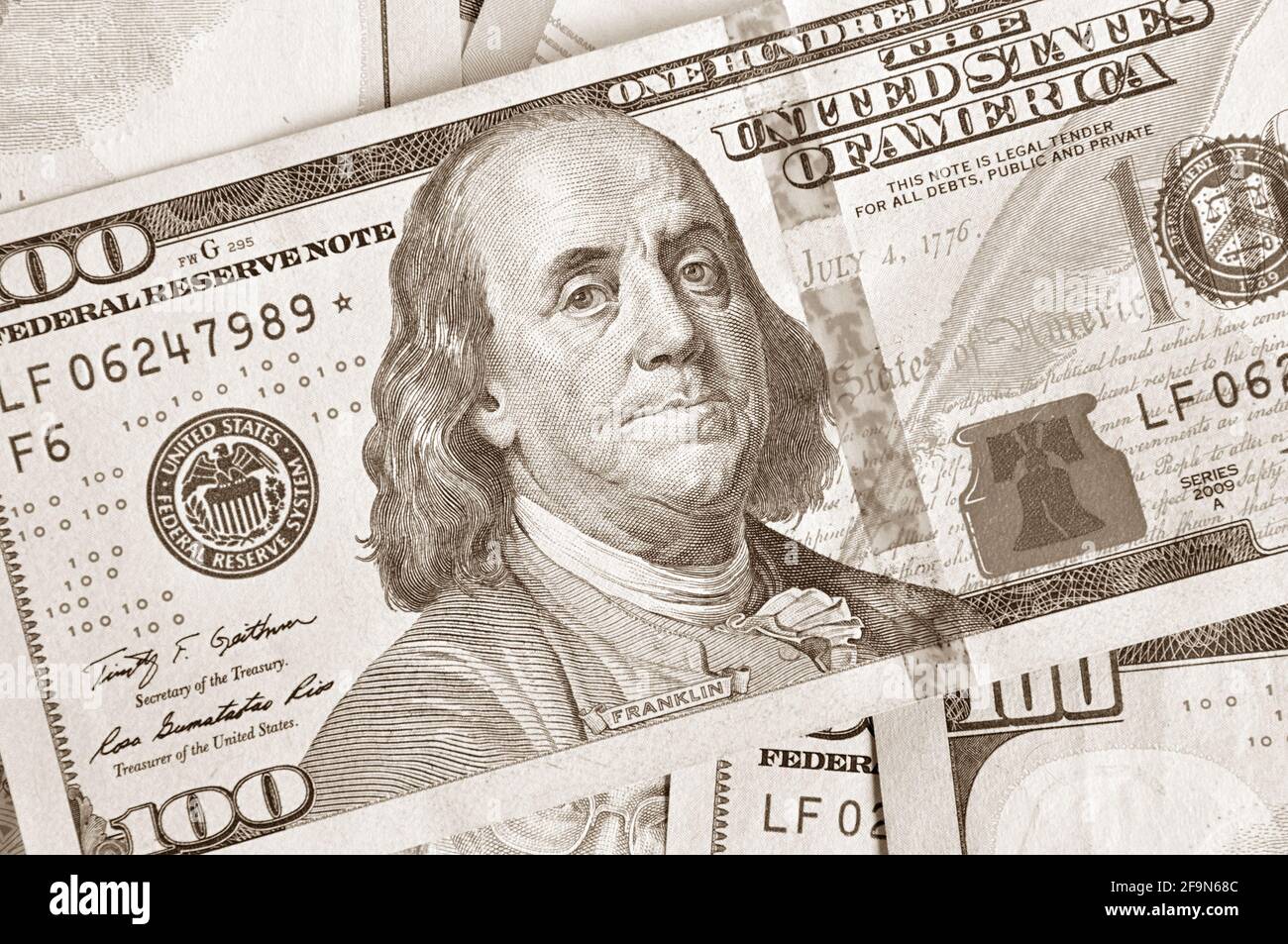Money - 100 United States dollars (USD) bills - focusing on Benjamin Franklin face Stock Photo
