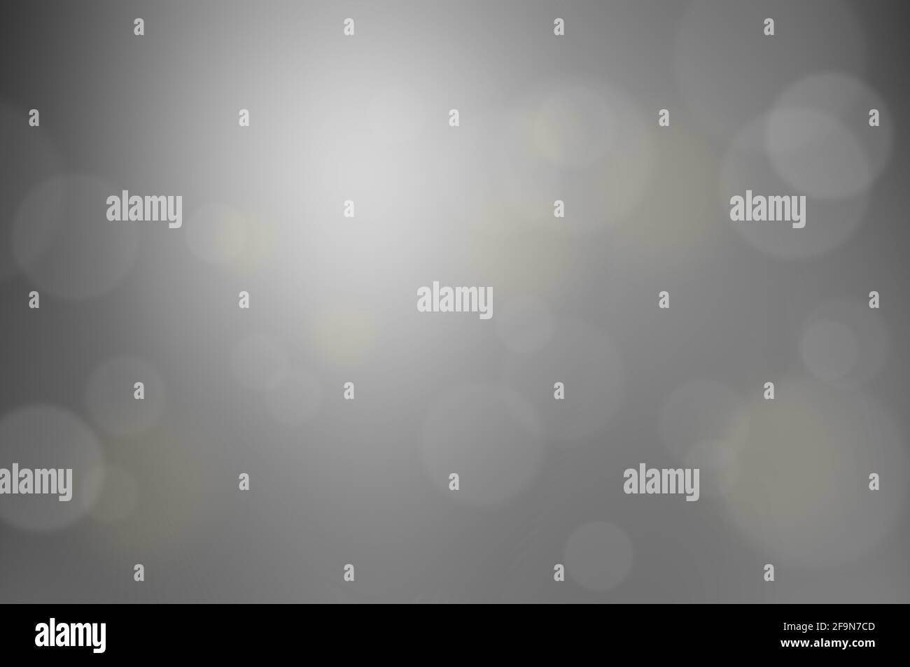 Gray abstract background with bokeh or lens flare effect Stock Photo