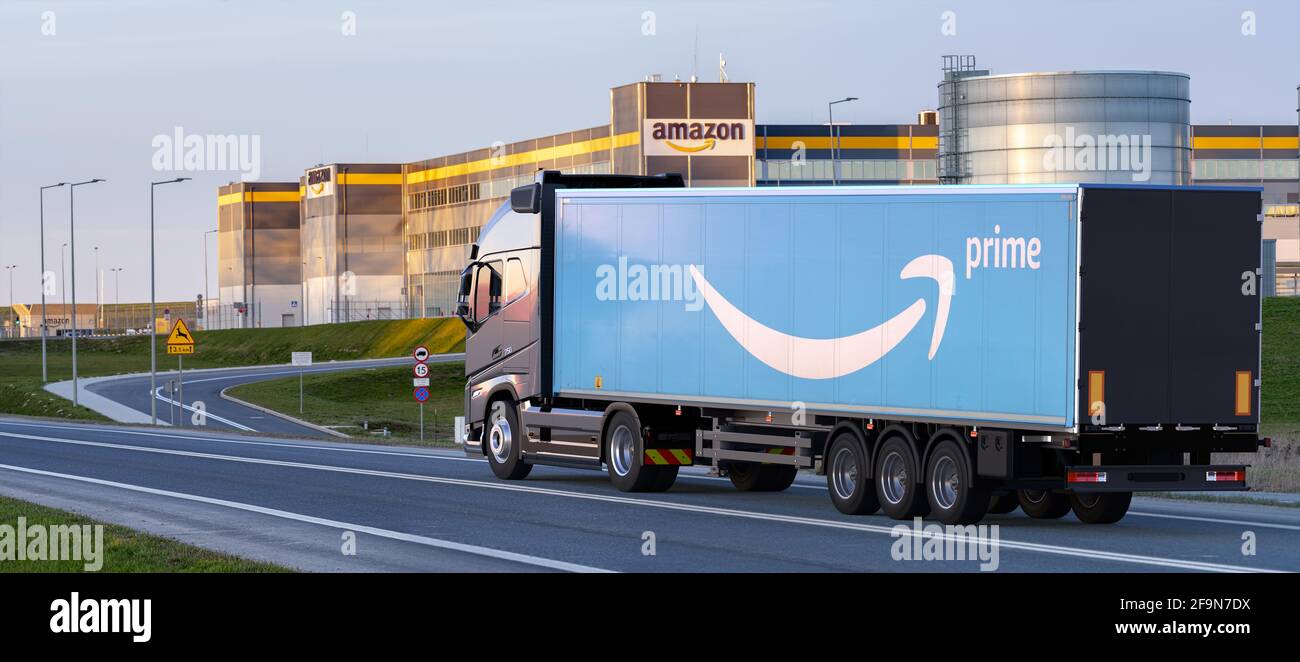 truck with a semi-trailer with the Amazon logo going to Amazon's logistics center Stock Photo