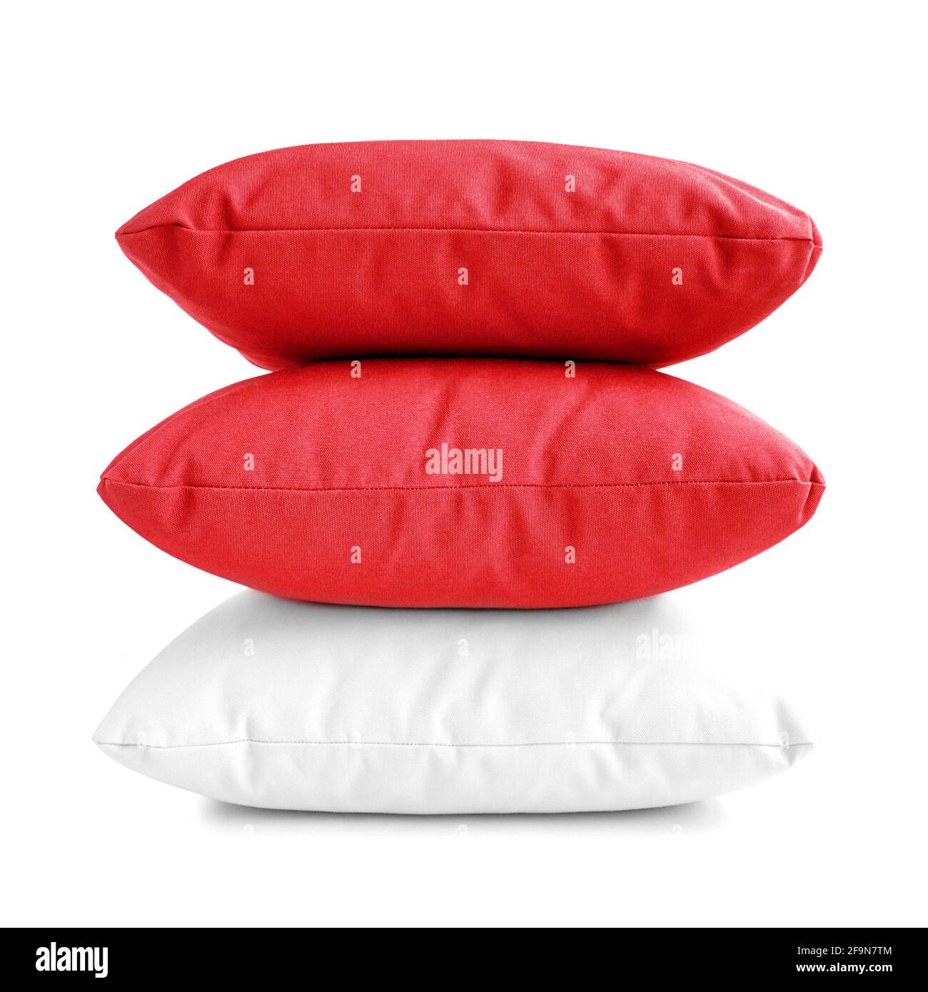 Pillows - stack of three cushions on white background Stock Photo - Alamy