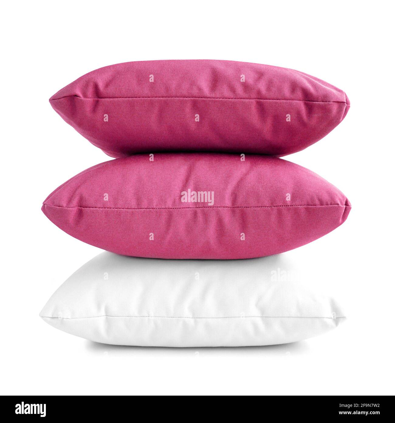 Pillows - stack of three cushions on white background Stock Photo