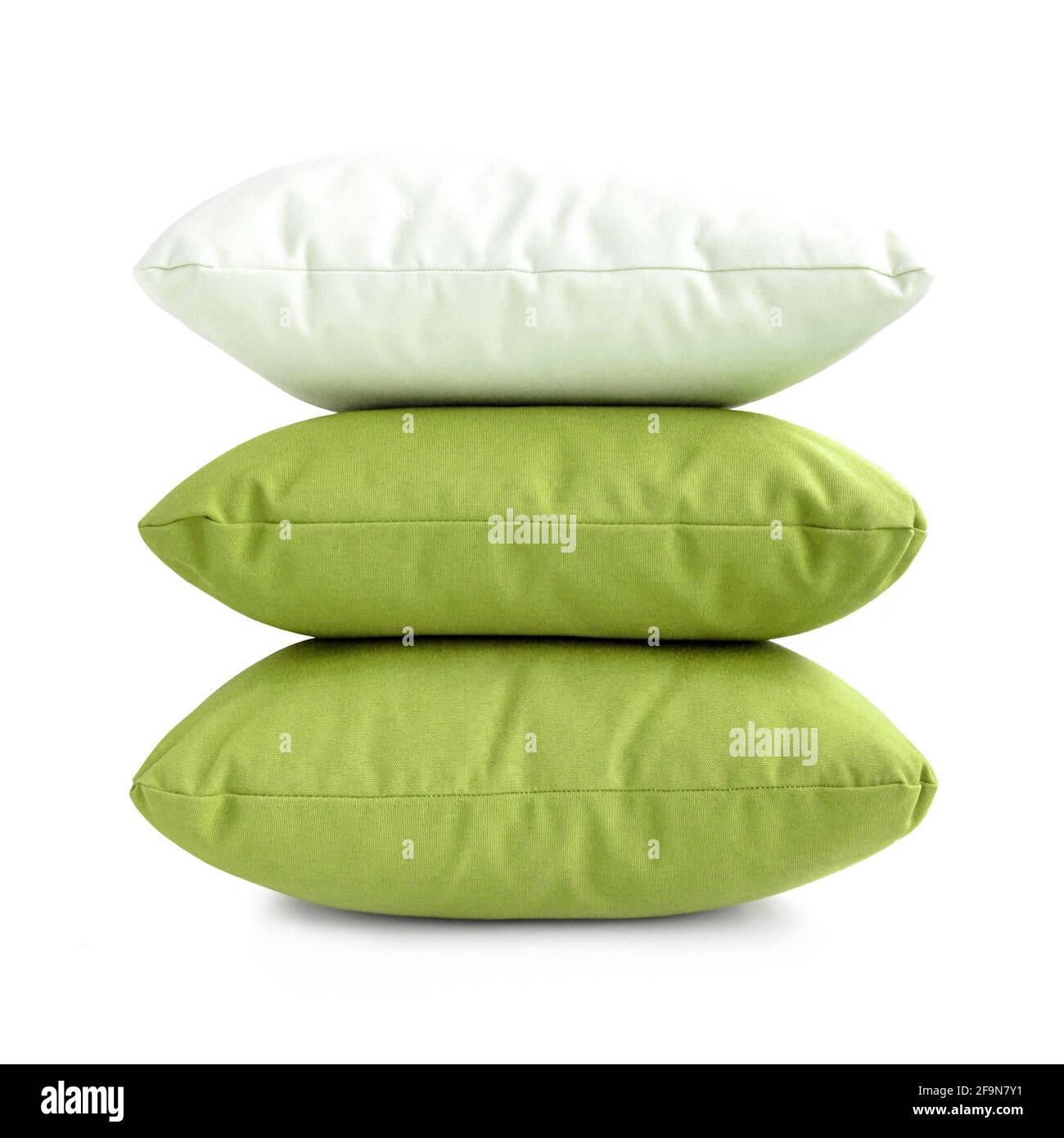 Pillows - stack of three cushions on white background Stock Photo