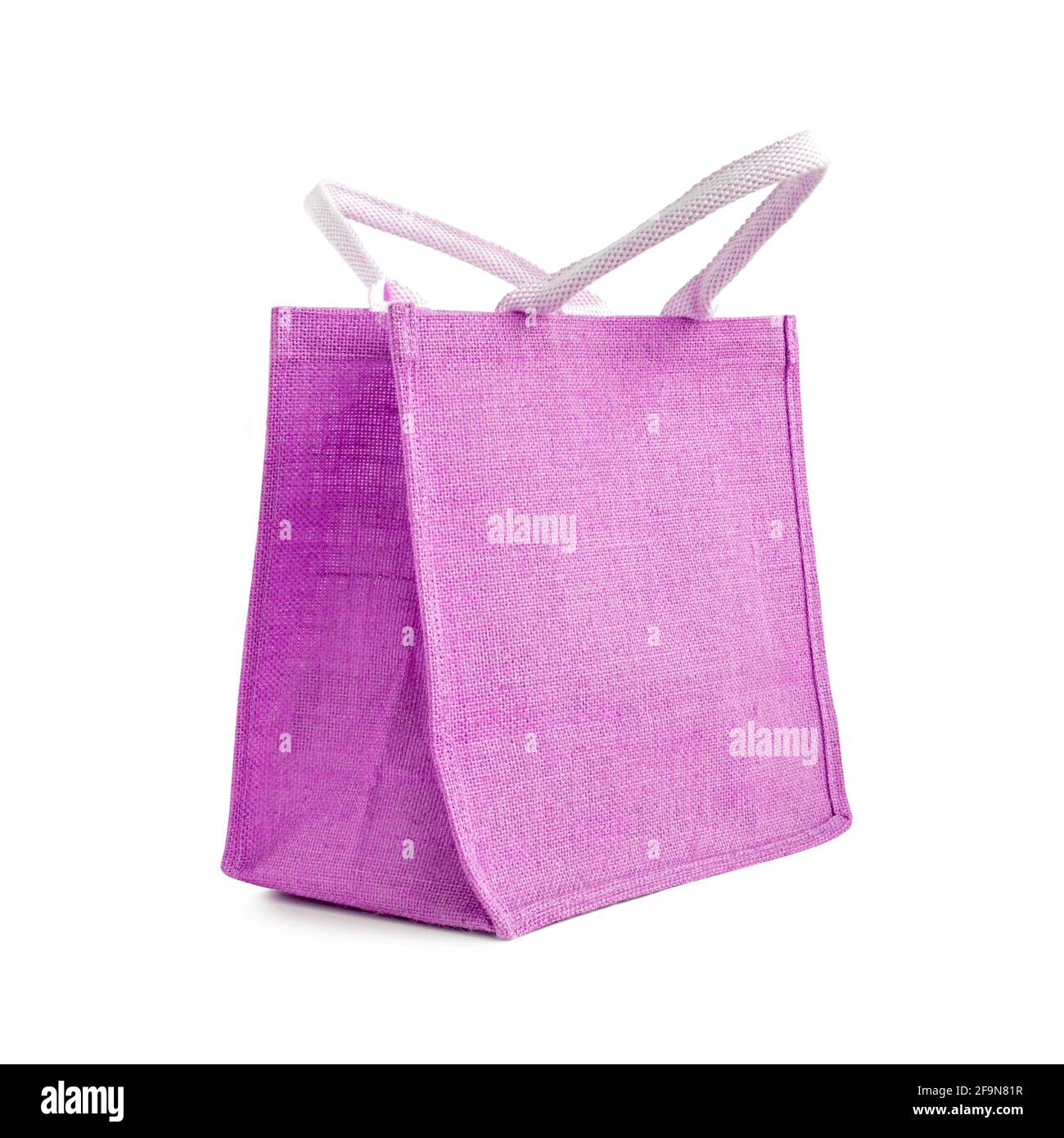 Hessian or jute bag - reusable purple shopping bag with loop handles - isolated Stock Photo
