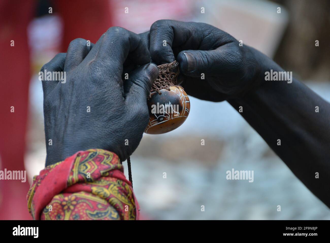 Non Exclusive: MEXICO CITY, MEXICO - APRIL 19: An actor who performs Quetzalcoatl character holds a cacao bean during ‘ the legend of Cacao’ theatre p Stock Photo