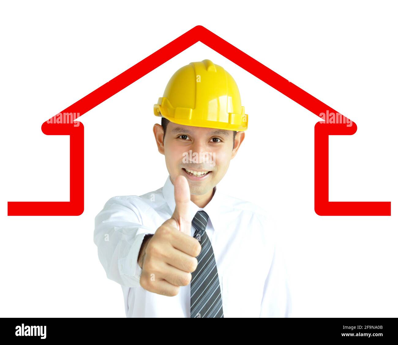 Smiling Asian architect (or engineer ) with yellow hard hat giving thumbs up on home outline background Stock Photo