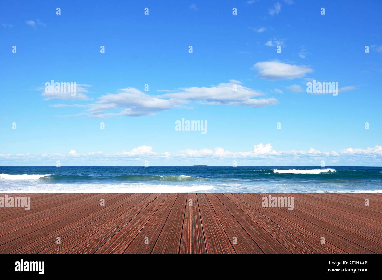 Wood plank on blue sea & sky background Stock Photo