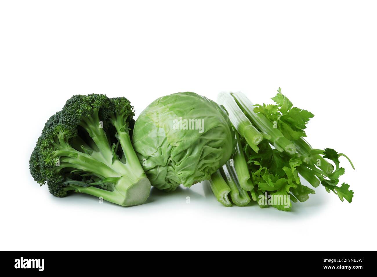 Fresh green vegetables isolated on white background Stock Photo - Alamy