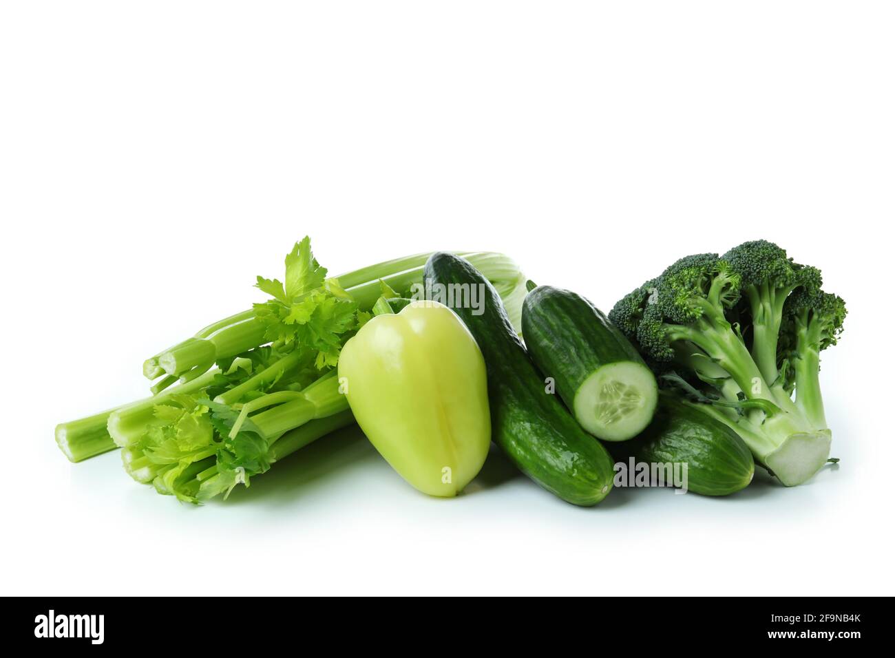 Fresh green vegetables isolated on white background Stock Photo - Alamy