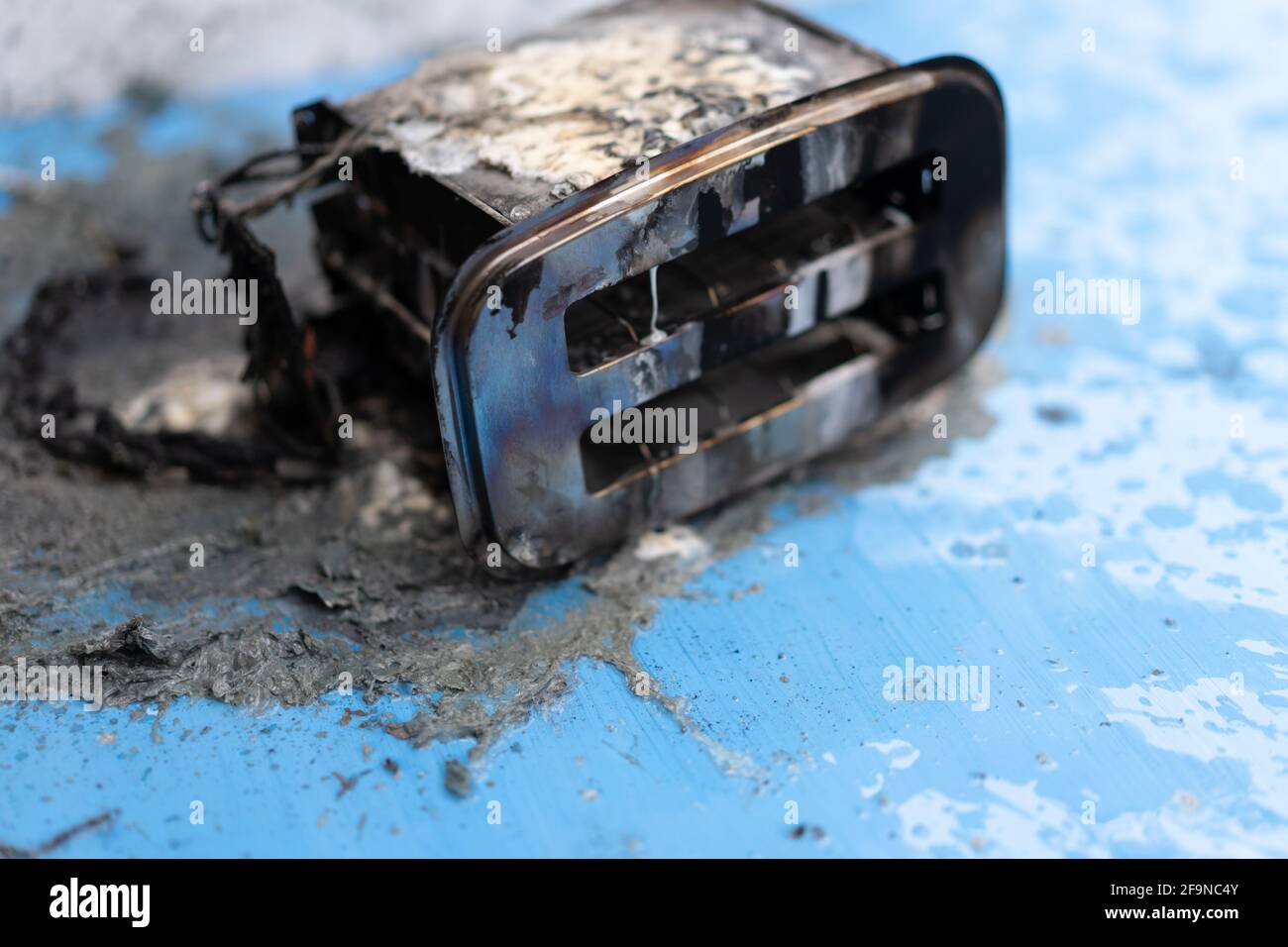 Toaster after fire. Household electrical appliance fire hazard