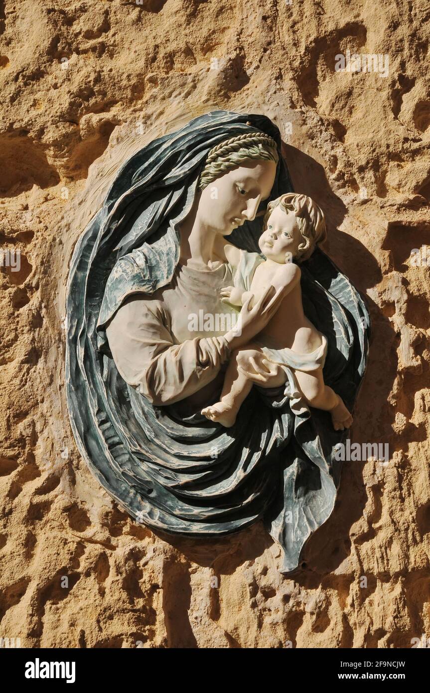 Ceramic wall plaque with virgin Mary and baby Jesus on the streets of Valetta, Malta Stock Photo
