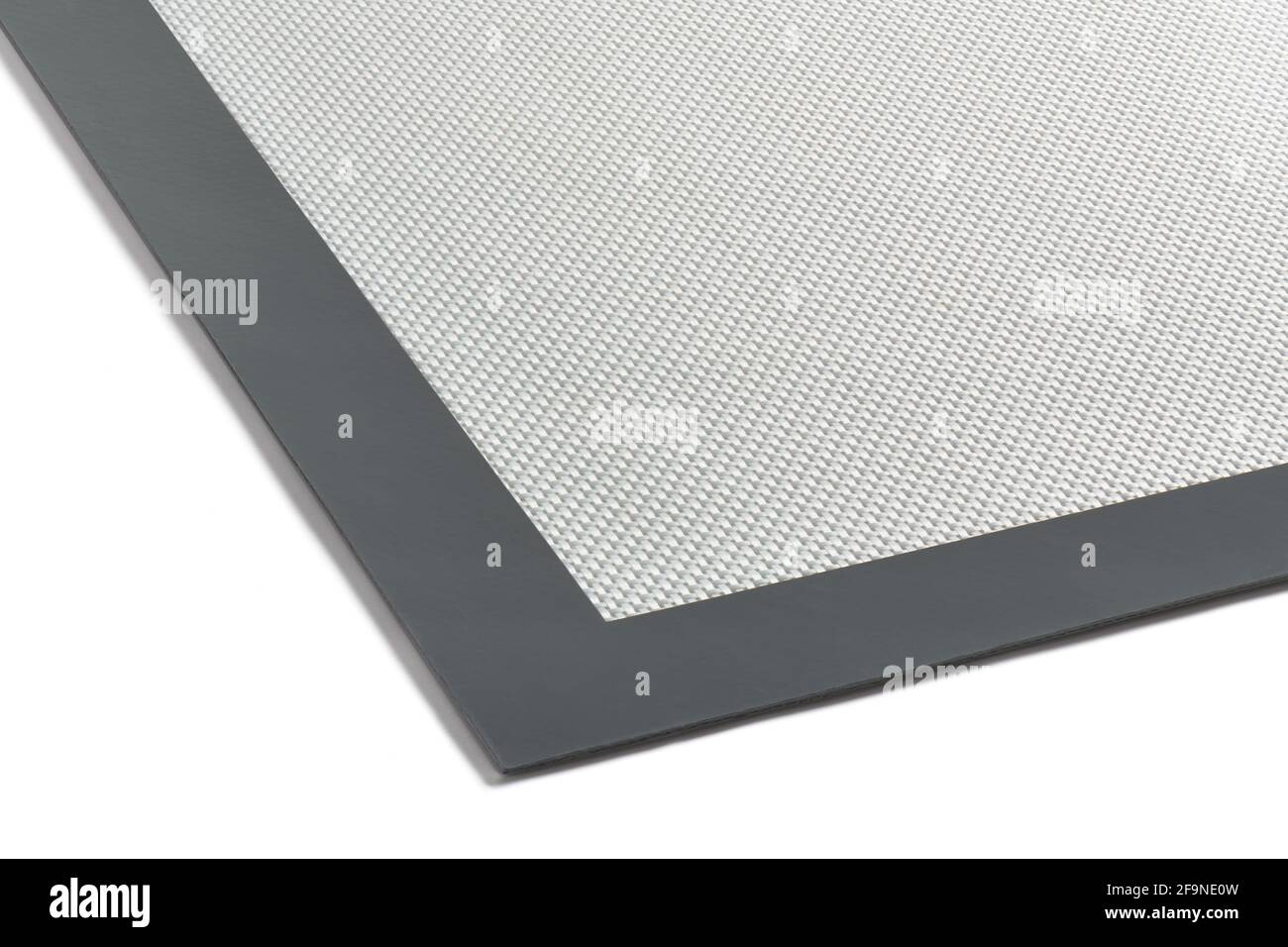 Fragment of multipurpose fiberglass silicone baking mat, cut out Stock Photo