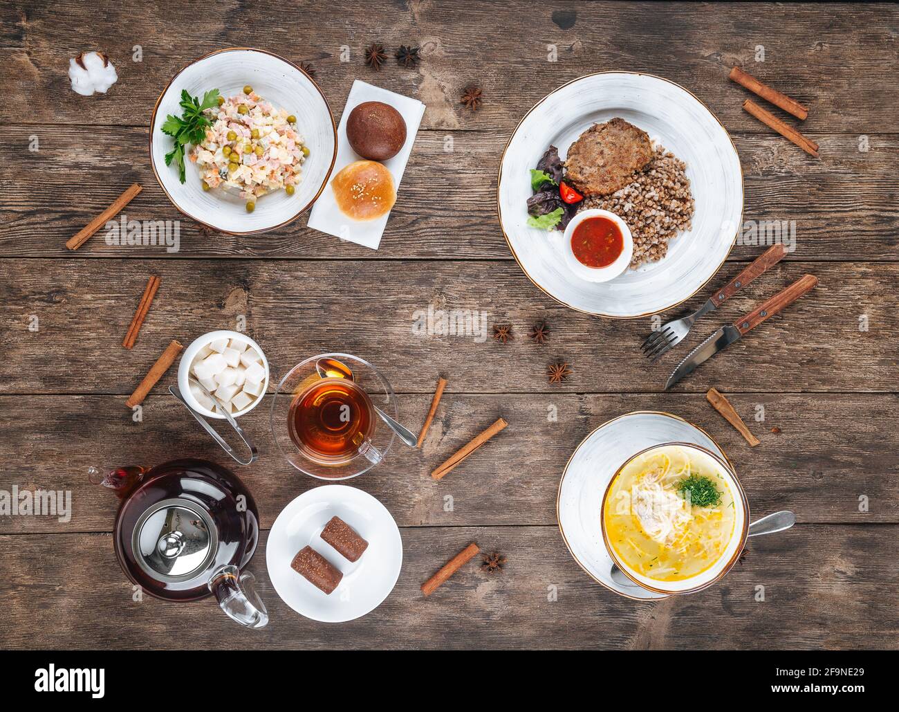 Elegant table setting with full serving of traditional fanesca soup and  accessories Stock Photo - Alamy