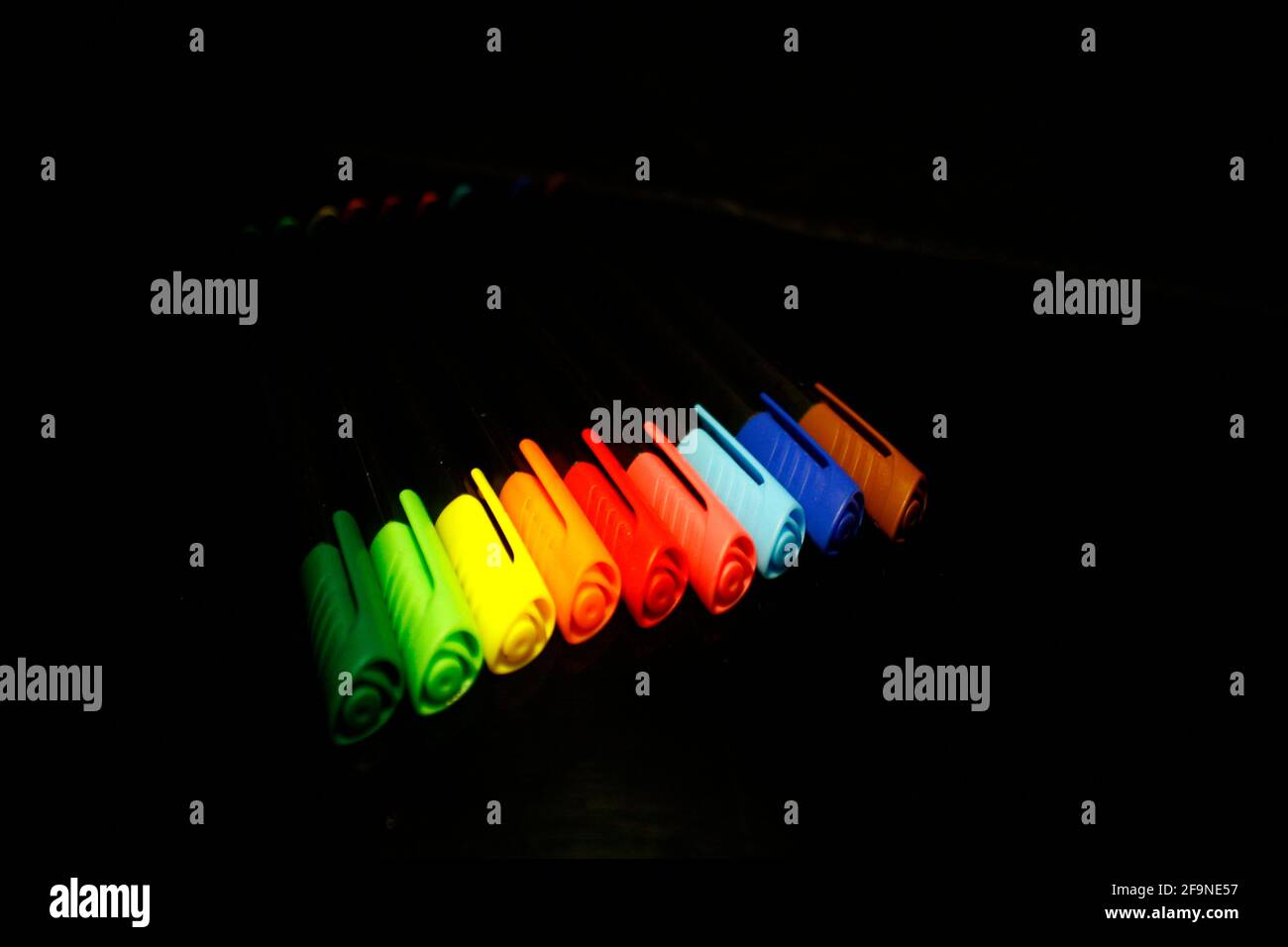 Multicolor Inline fineliner covers isolated on black Stock Photo