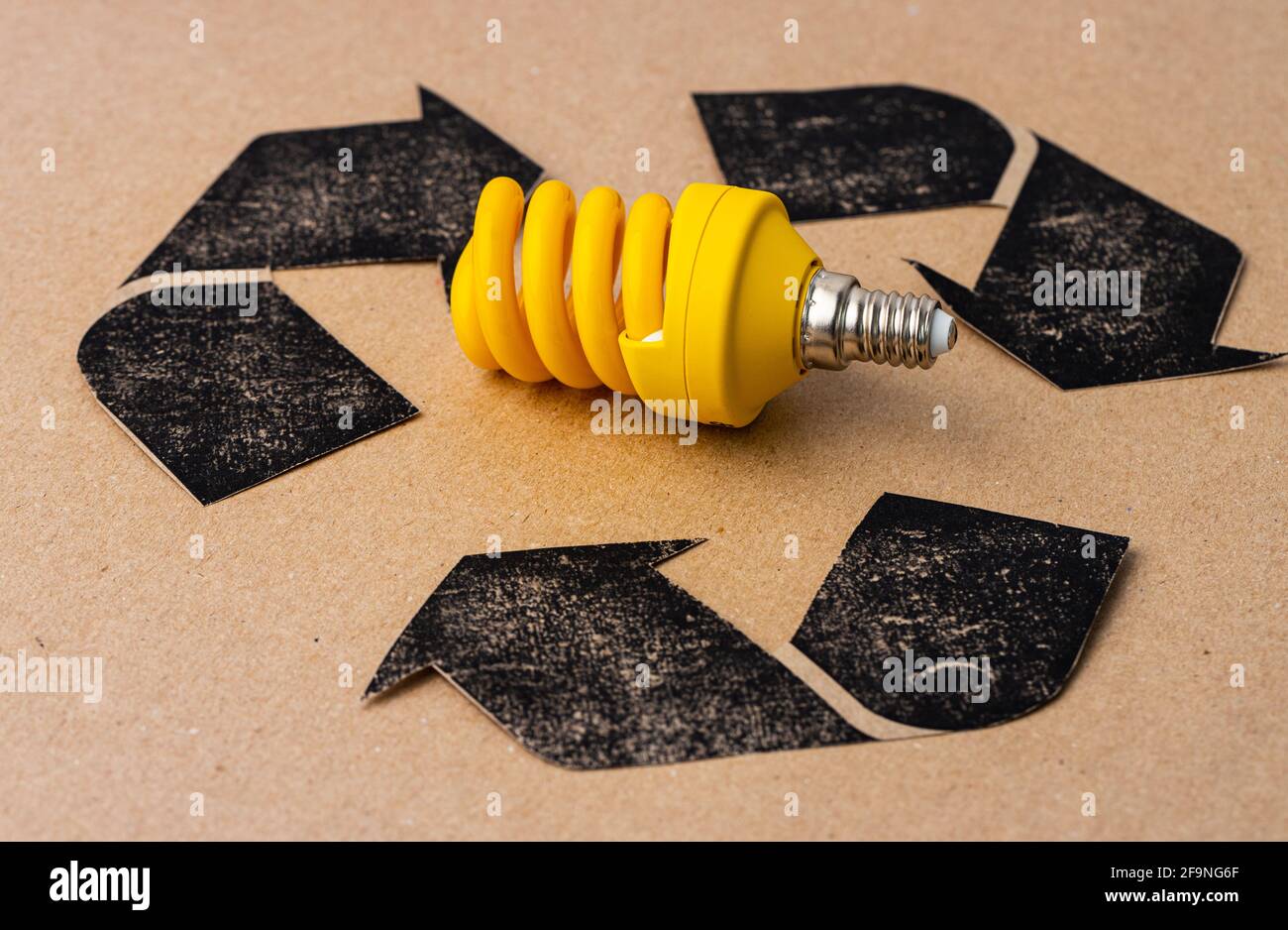 LED light bulb with recycle symbol on craft paper Stock Photo Alamy