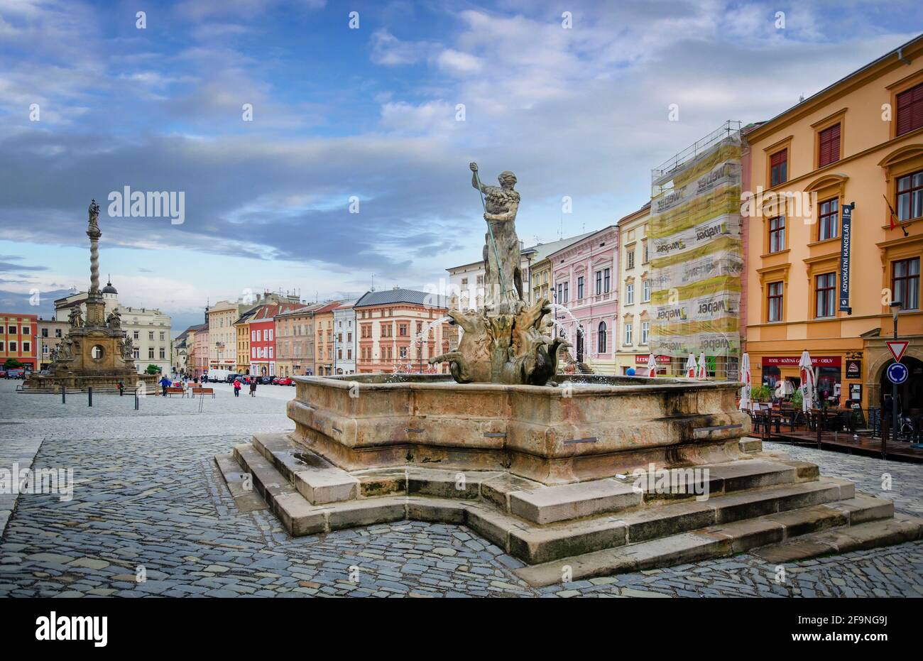 Olomouc, Czech Republic. Neptune Fountain and the Marian column in Olomouc. Stock Photo