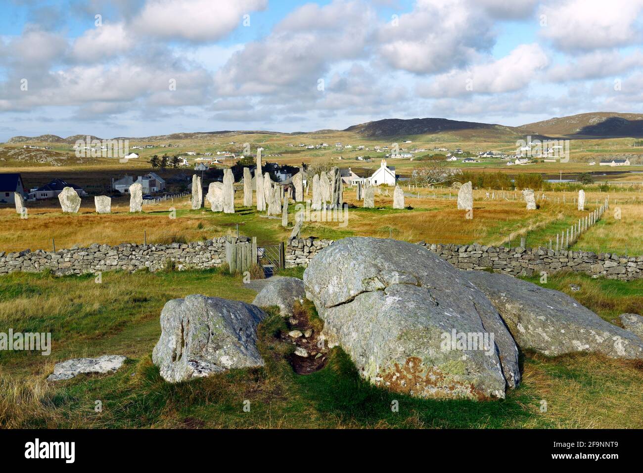 Tursachan prehistoric stones at Callanish, Lewis, Scotland aka Callanish I. North over circle and alignments from the focal crag and tail rock outcrop Stock Photo