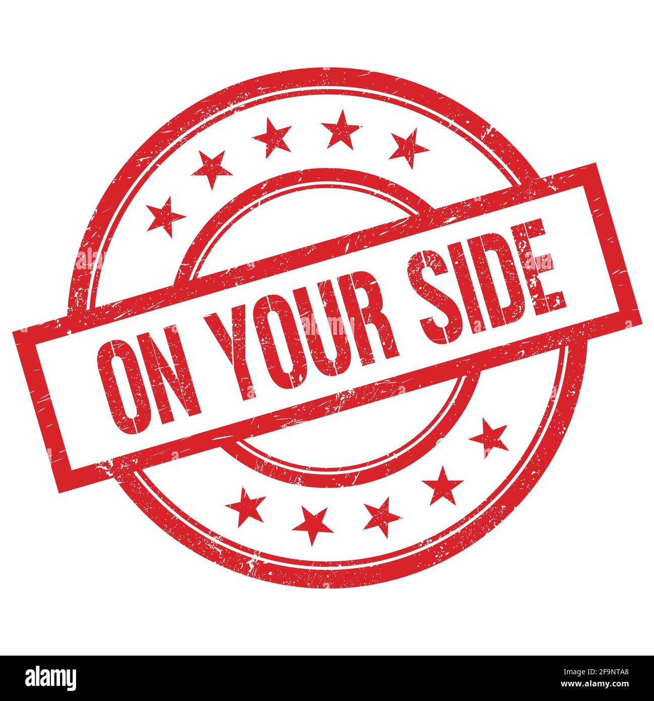 ON YOUR SIDE text written on red round vintage rubber stamp Stock Photo