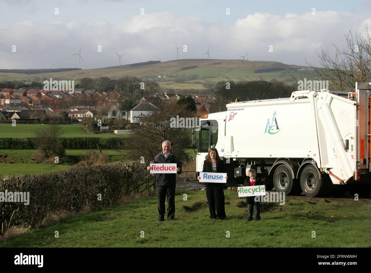 Reduce Reuse Recycle Child Mum And Grandfather Hold Signs Up Stock Photo Alamy