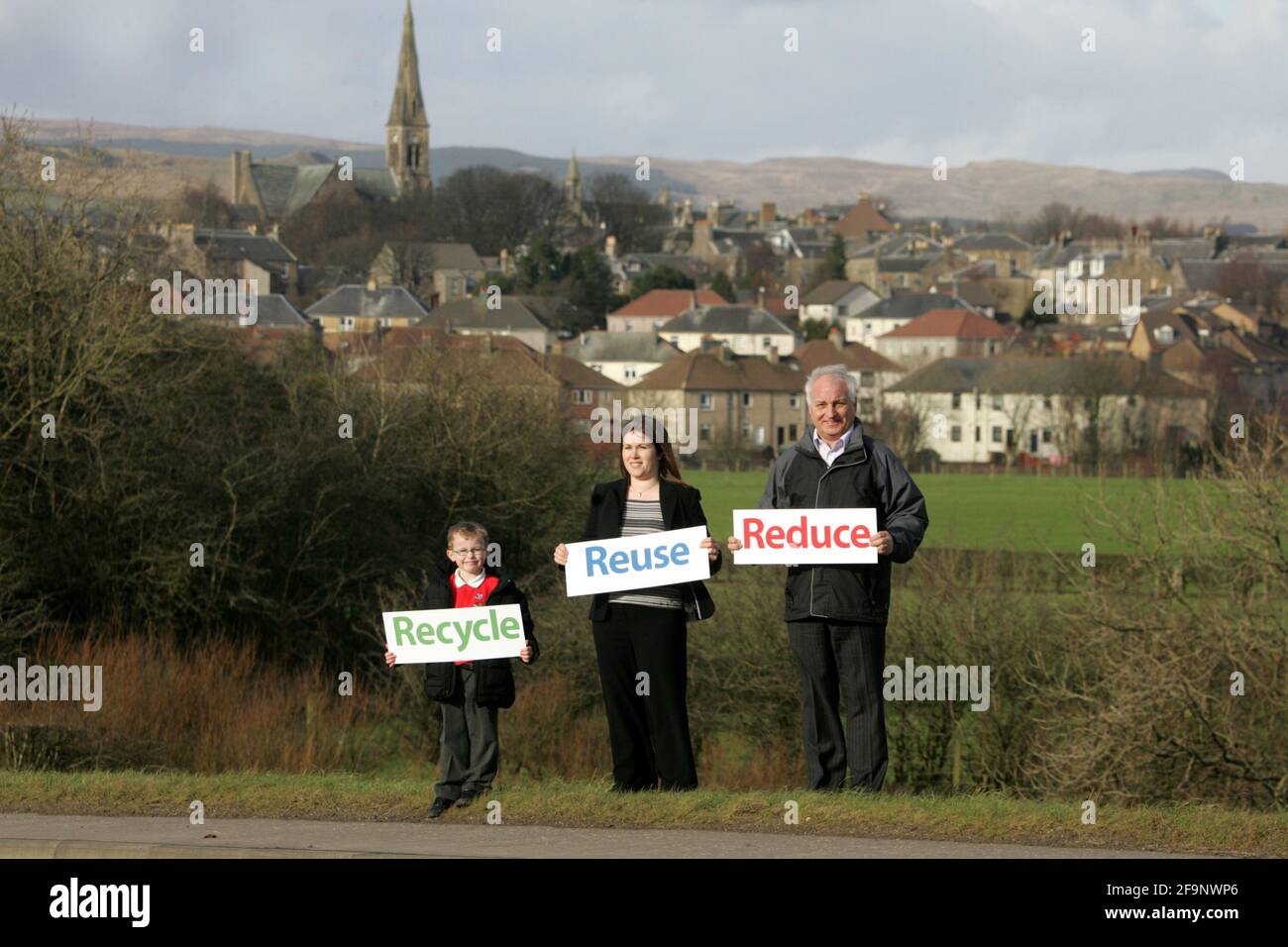 Reduce Reuse Recycle Child Mum And Grandfather Hold Signs Up Stock Photo Alamy