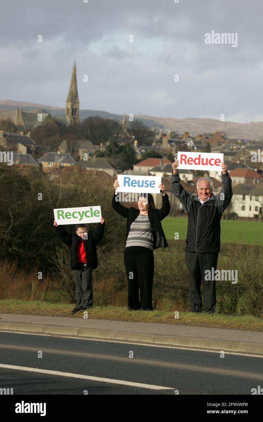 Reduce Reuse Recycle Child Mum And Grandfather Hold Signs Up Stock Photo Alamy