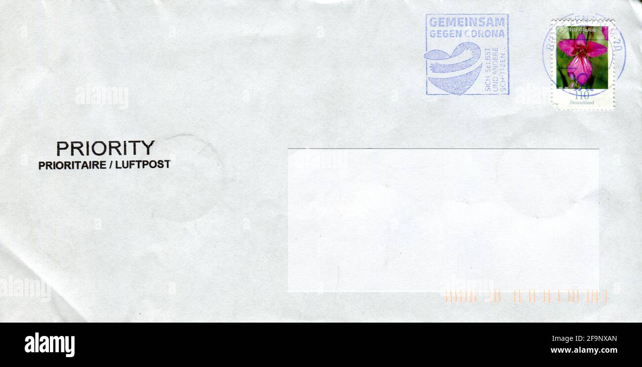 GOMEL, BELARUS - APRIL 20, 2021: Old envelope which was dispatched from Germany to Gomel, Belarus, March 21, 2021. Stock Photo