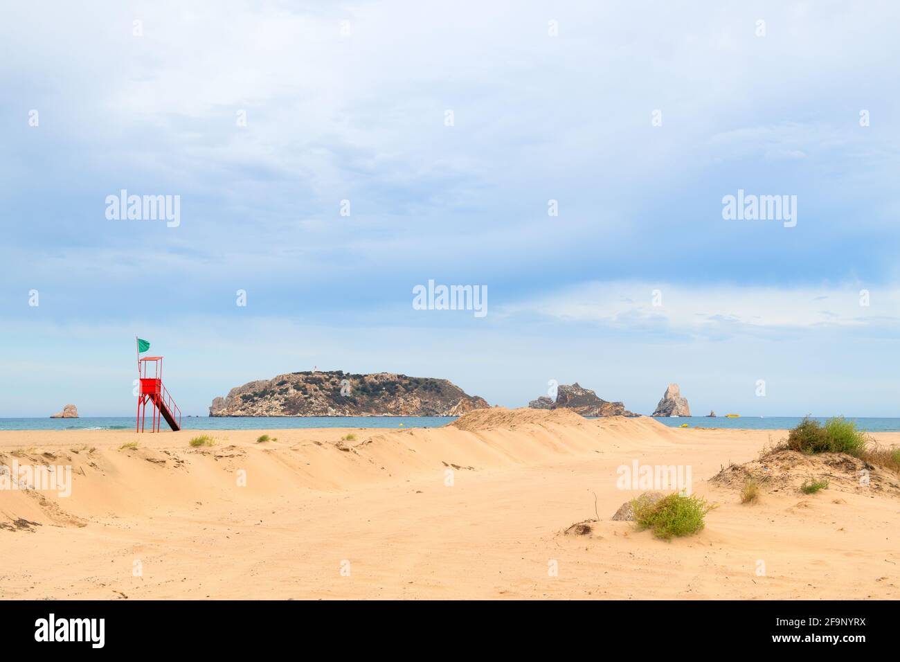 Empty beach with islands Les Medes in Spanish Estartit Stock Photo