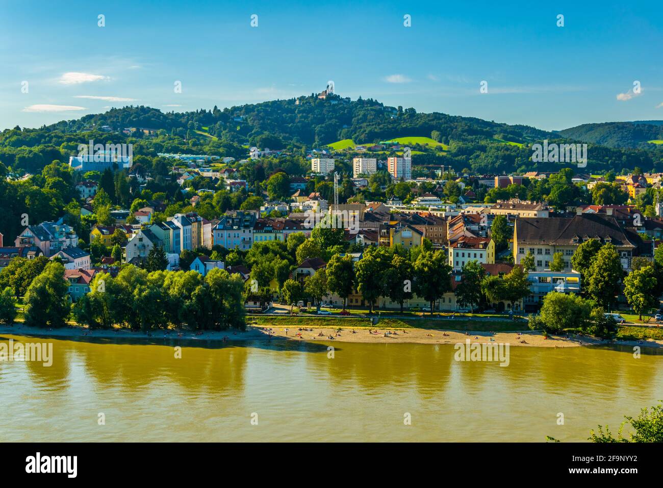 Riverside of Danube with the Poestlingberg Basilica, Linz, Austria ...