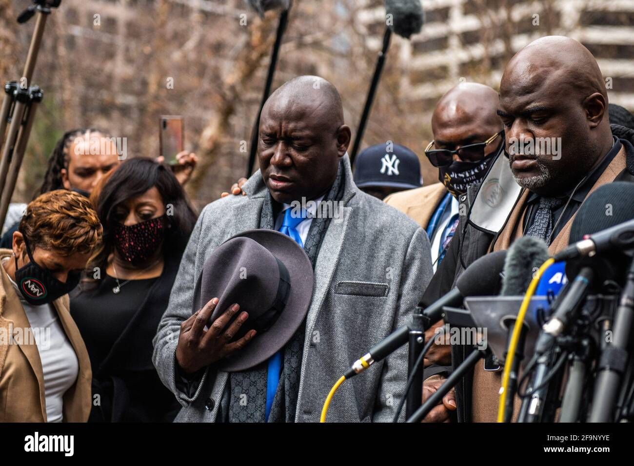 Rachel Noerd, Lawyer Benjamin Crump, Philonise Floyd and Rodney Floyd have a moment of silent prayer during a press conference outside the Hennepin County Government Center on April 19, 2021, the day of closing arguments and the beginning of jury deliberation in the Derek Chauvin Trial in Minneapolis, Minnesota. Photo: Chris Tuite /ImageSPACE/MediaPunch Stock Photo