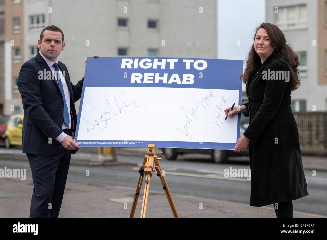 Glasgow, Scotland, UK. 20 April 2021. PICTURED: (left) Douglas Ross MP, Scottish Conservative and Unionist Party Leader, (right) Annemarie Ward, Advocacy Activist for those suffering and recovering from addiction and CEO of FAVORUK. Scottish Conservative leader Douglas Ross said: “For too long, the government has taken its eye off the ball, by its own admission. Tackling drug deaths has not been a priority and that has to change now. Too many lives have already been lost. Recovery experts have raised the alarm that Scotland's drug deaths figures “undoubtedly will rise” as people still cannot Stock Photo