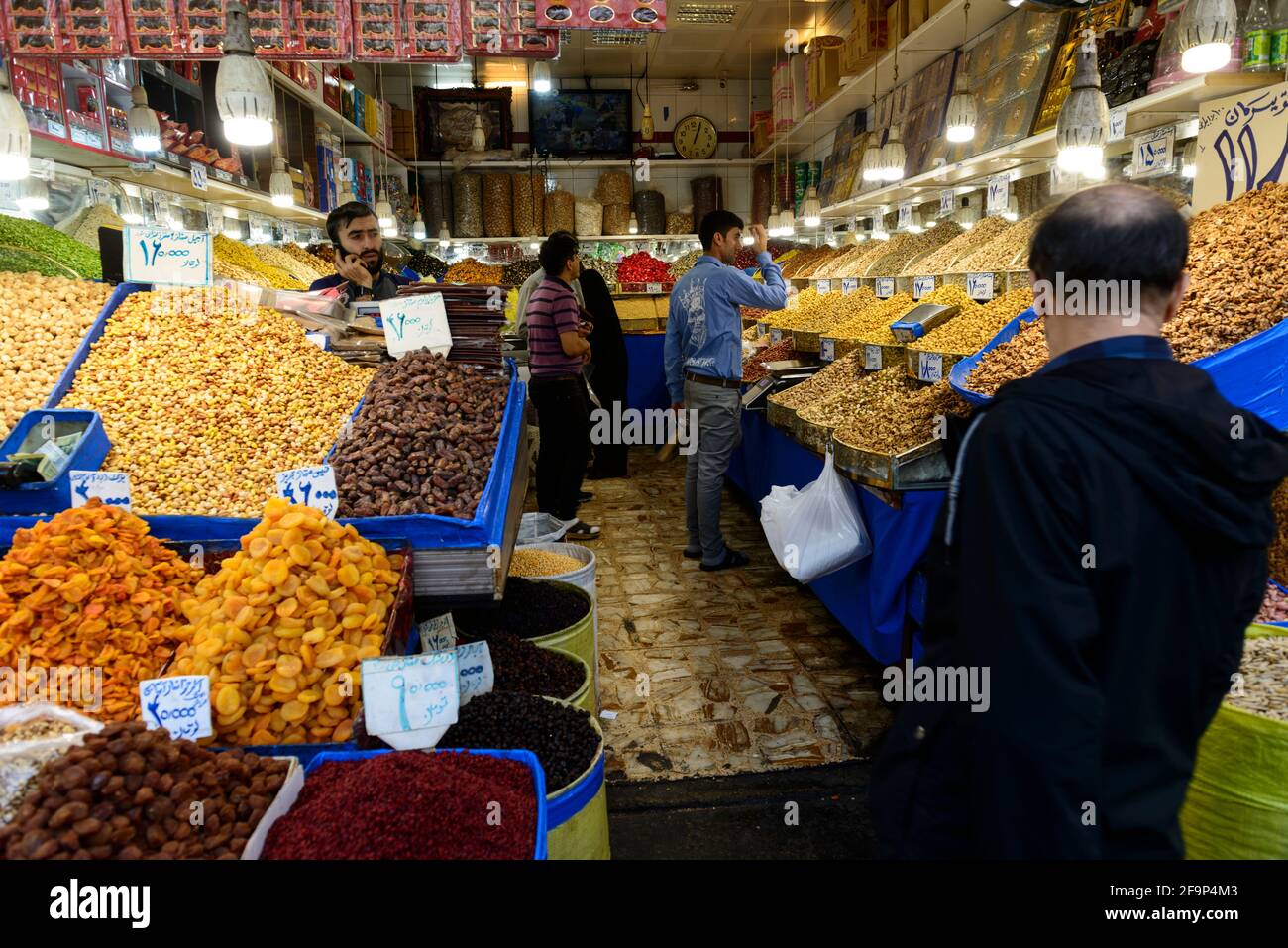 Shop of dried fruits and nuts in the Grand Bazaar of Tehran, Iran. Stock Photo