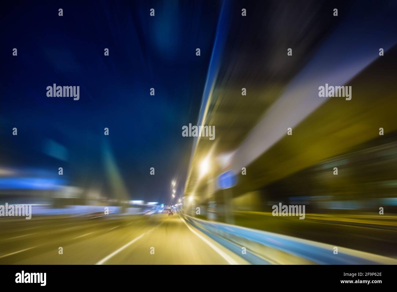 high-speed movement on the night road Stock Photo
