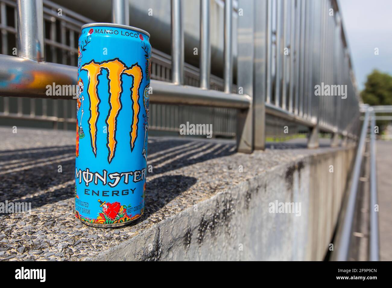 Mango Loco flavour Monster Energy drink, outdoor. Stock Photo