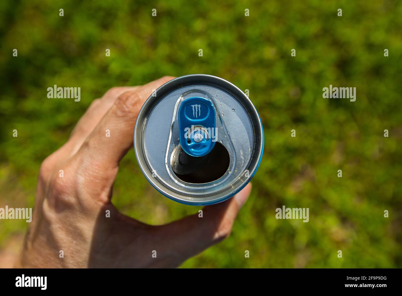 A top down view of a open Monster Energy drink can. Stock Photo