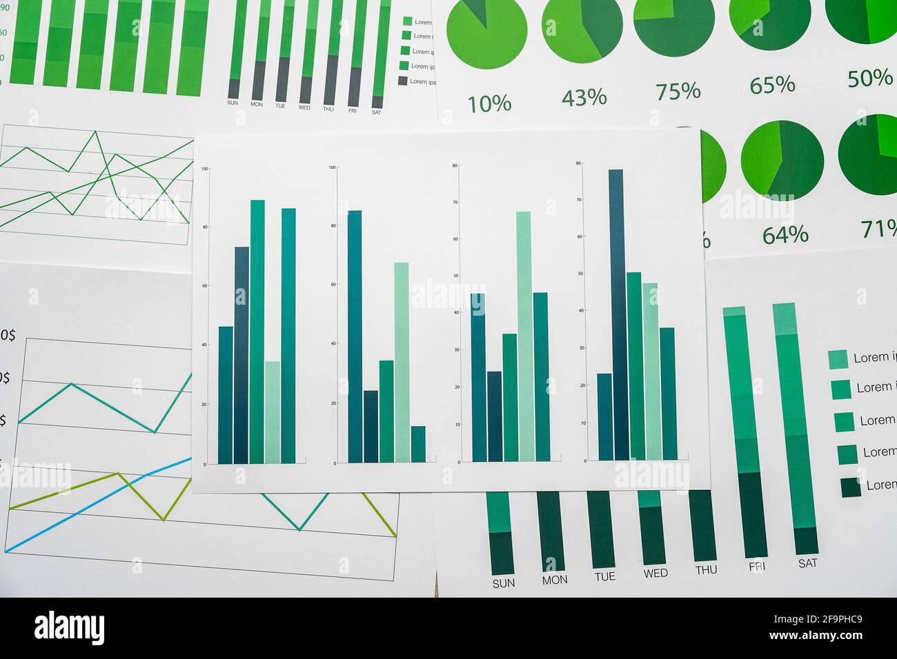 Stock Chart Papers Financial paper with charts and diagrams on gray table Stock Photo - Alamy