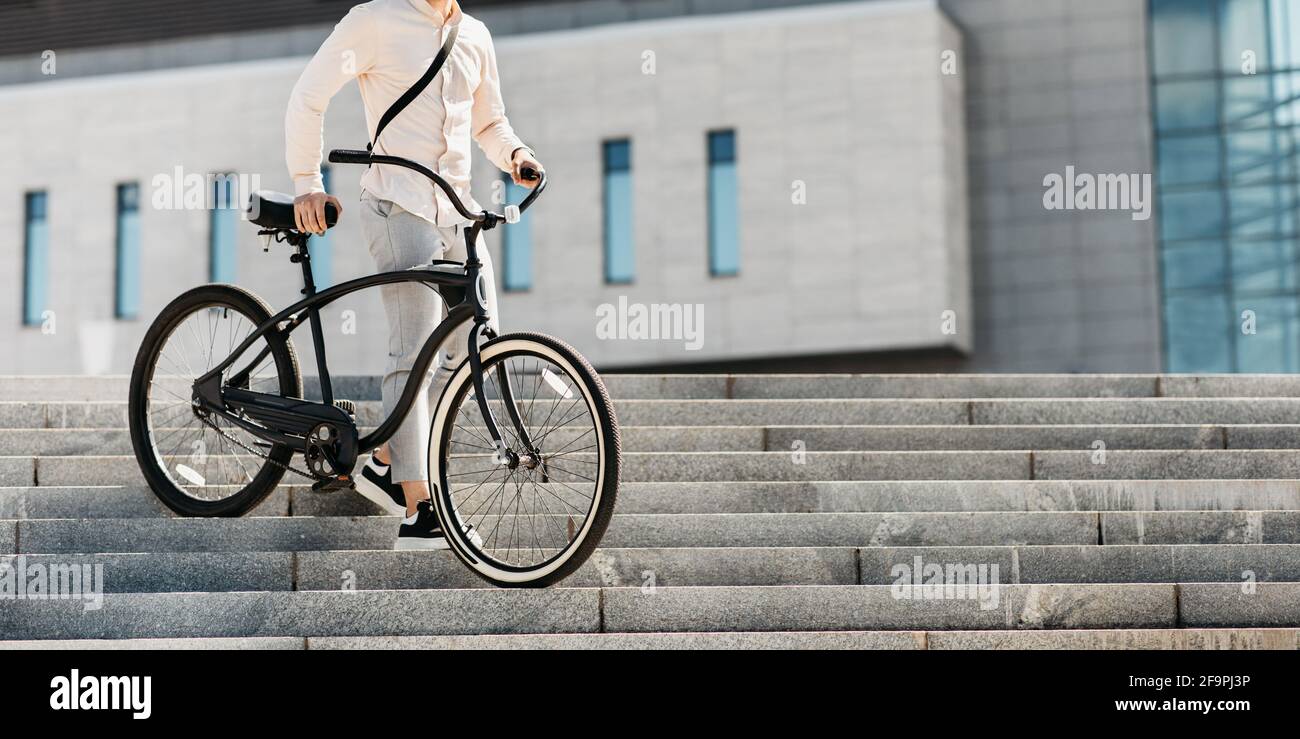 Modern walking, short way to work and eco transport in town Stock Photo