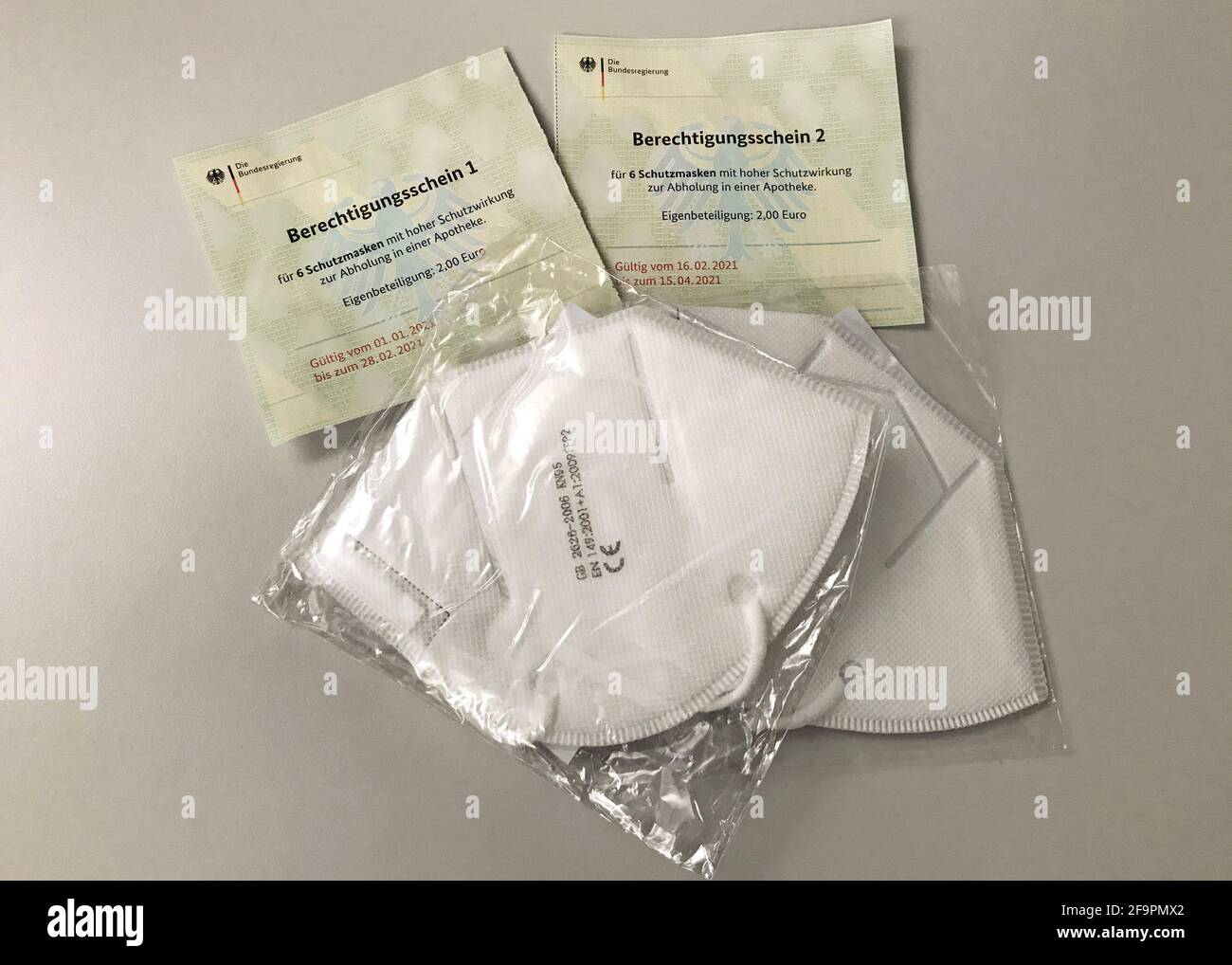 26.01.2021, Berlin, , Germany - FFP2 masks are on authorization slips from the federal government to pick up protective masks at the pharmacy. 00S2101 Stock Photo