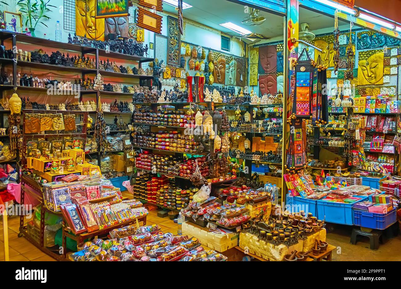 The souvenir store with wooden, plaster, plastic, metal statuettes,  figurines, Buddha Images, toys, magnets and other items, Khaosan Road,  Bangkok, Th Stock Photo - Alamy