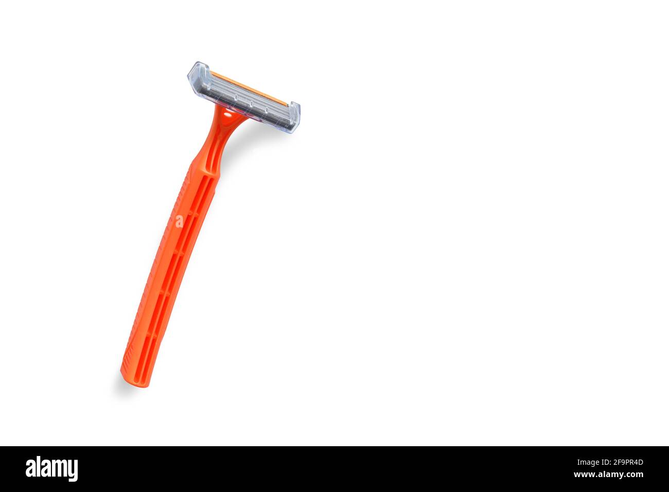 Disposable shaving razor orange Stock Photo
