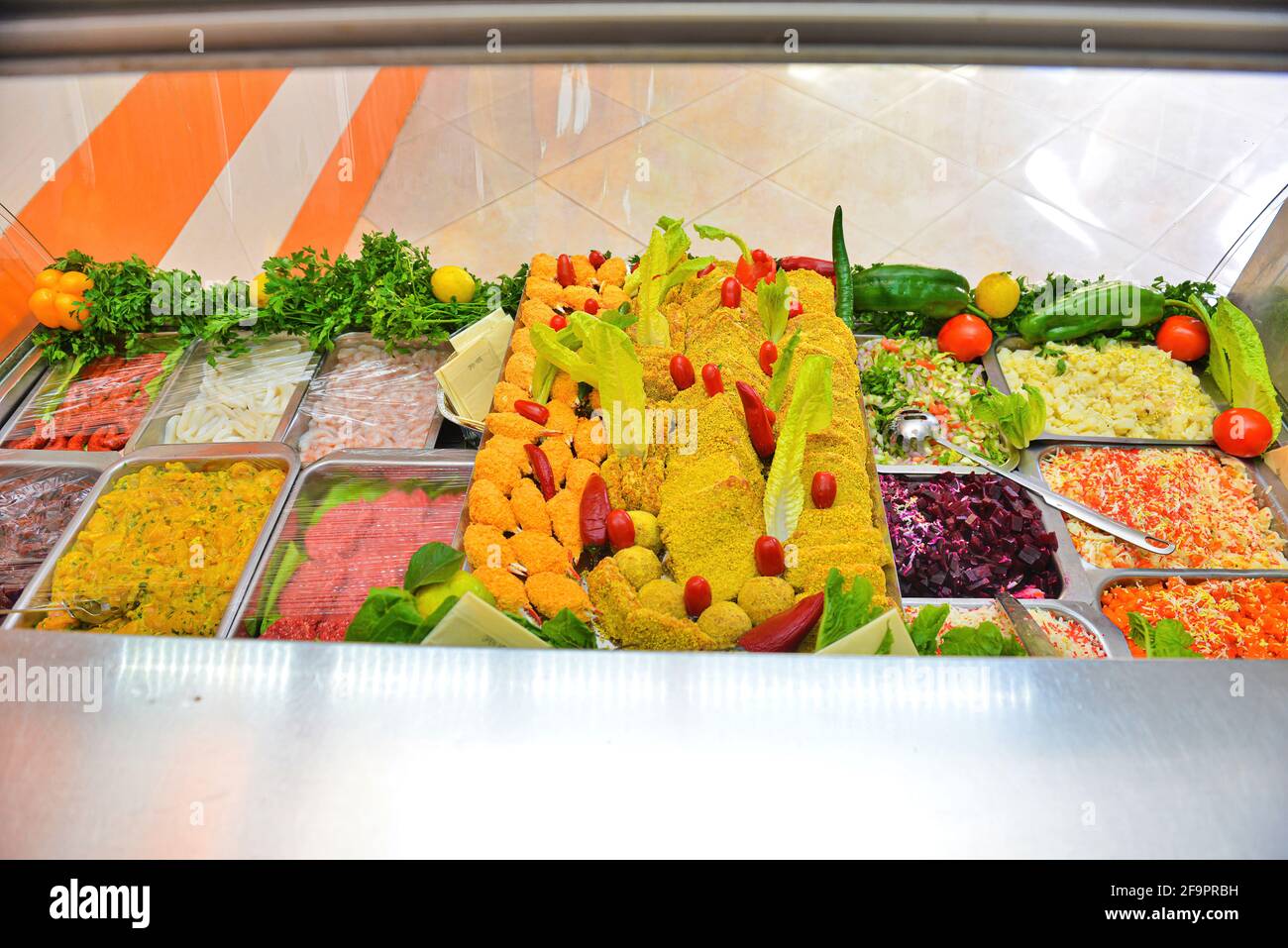 Preparing sandwiches, storefront for sandwiches. The concept of unhealthy eating. Stock Photo