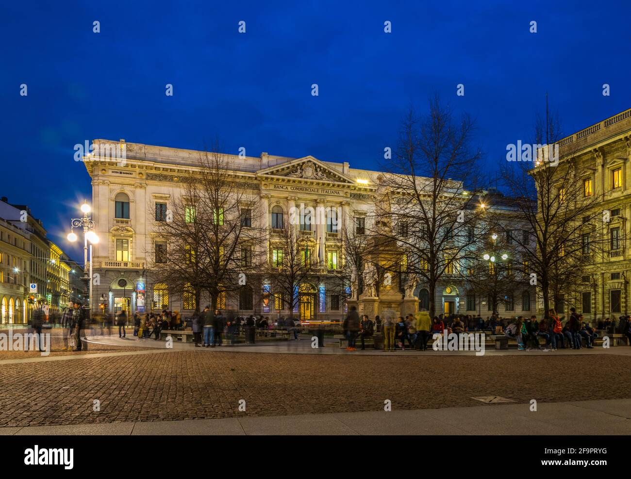 Night view of the illumintaed Palace of Italian Commercial Bank in milano Stock Photo