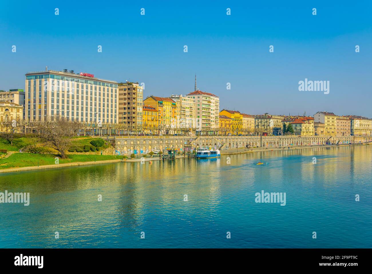 historical buildings stretched along riverside of po river in the ...