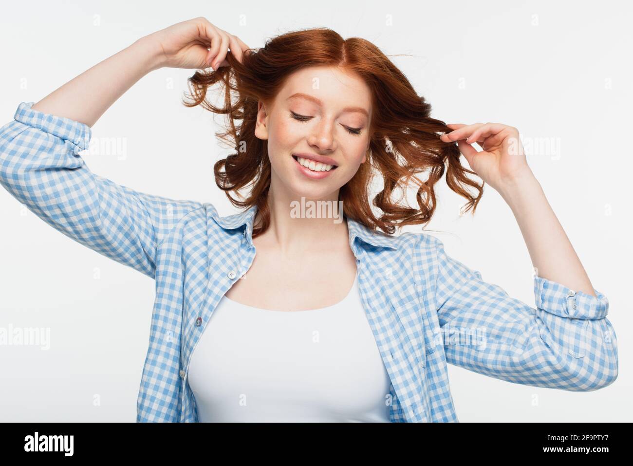 Woman in blue shirt hi-res stock photography and images - Alamy