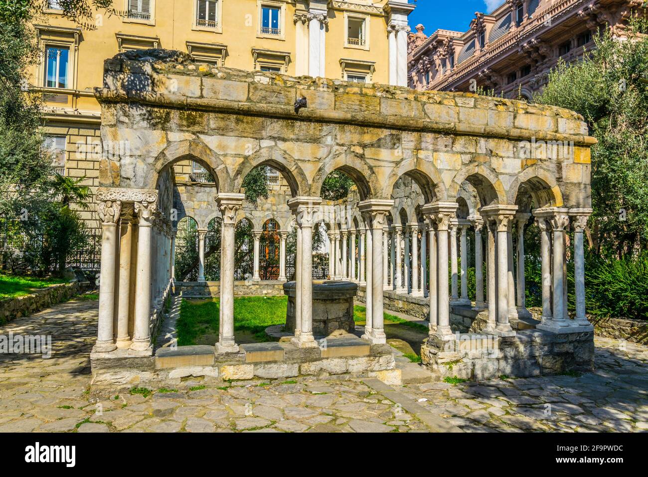 view of ruin of a 12th century cloister standing between Porta Soprana ...
