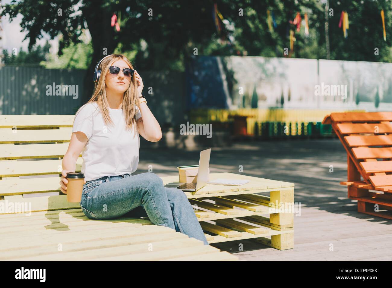 Woman in headphones having a video call Stock Photo - Alamy