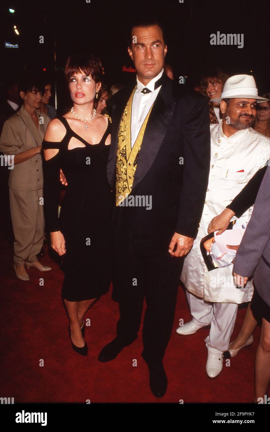 Kelly LeBrock and Steven Seagal attending the premiere of 'Under Siege ...