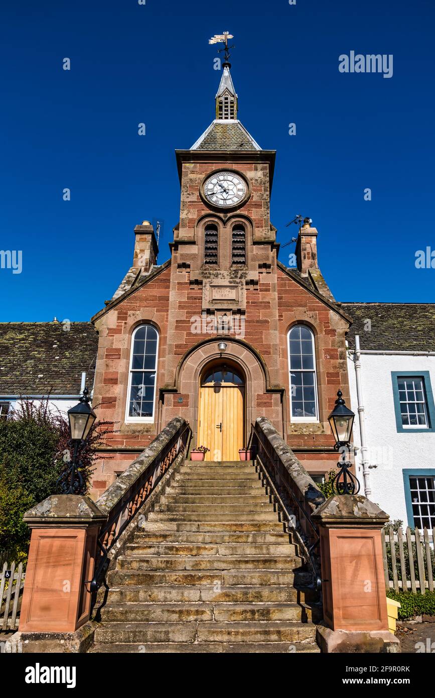 Picturesque Gifford Victorian village hall with blue sky, East Lothian, Scotland, UK Stock Photo