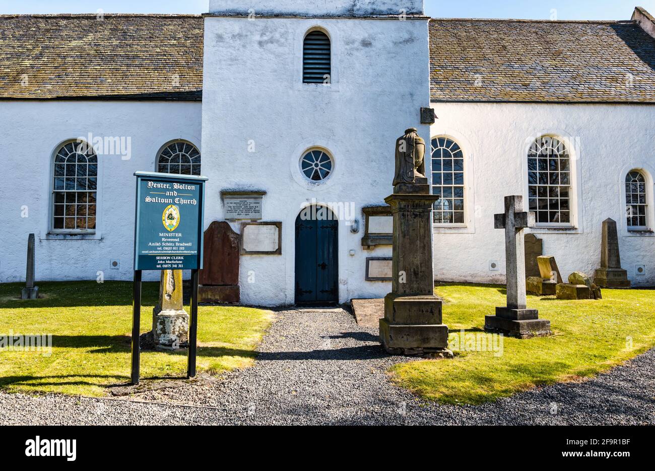 Gifford village church with old graves in cemetery graveyard, Yester parish, East Lothian, Scotland, UK Stock Photo