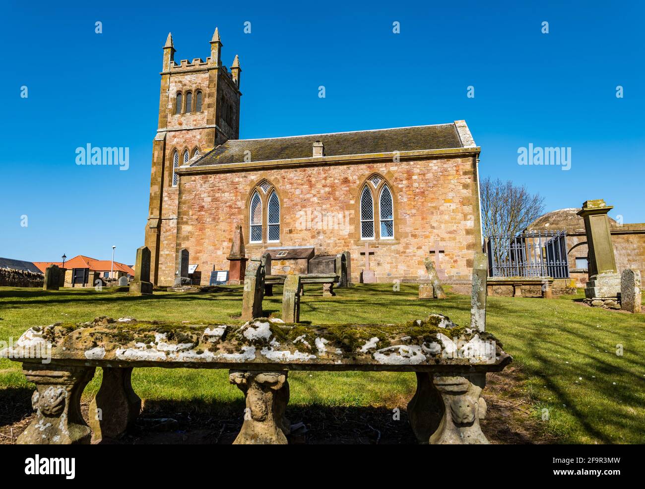 Bolton Parish Church and old graves on sunny day with bue sky, East Lothian, Scotland, UK Stock Photo