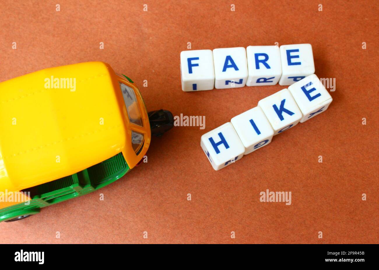 Auto rickshaw fare hike concept depiction Stock Photo