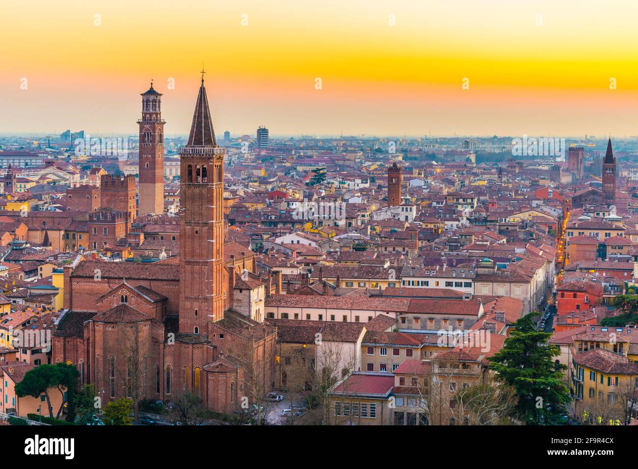 aerial view of the italian city verona during sunset including church ...
